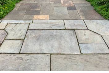 Recently repaired sidewalk with smooth, even surface and no visible damage.