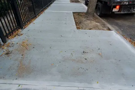 newly installed sidewalk in nyc with expansion joints